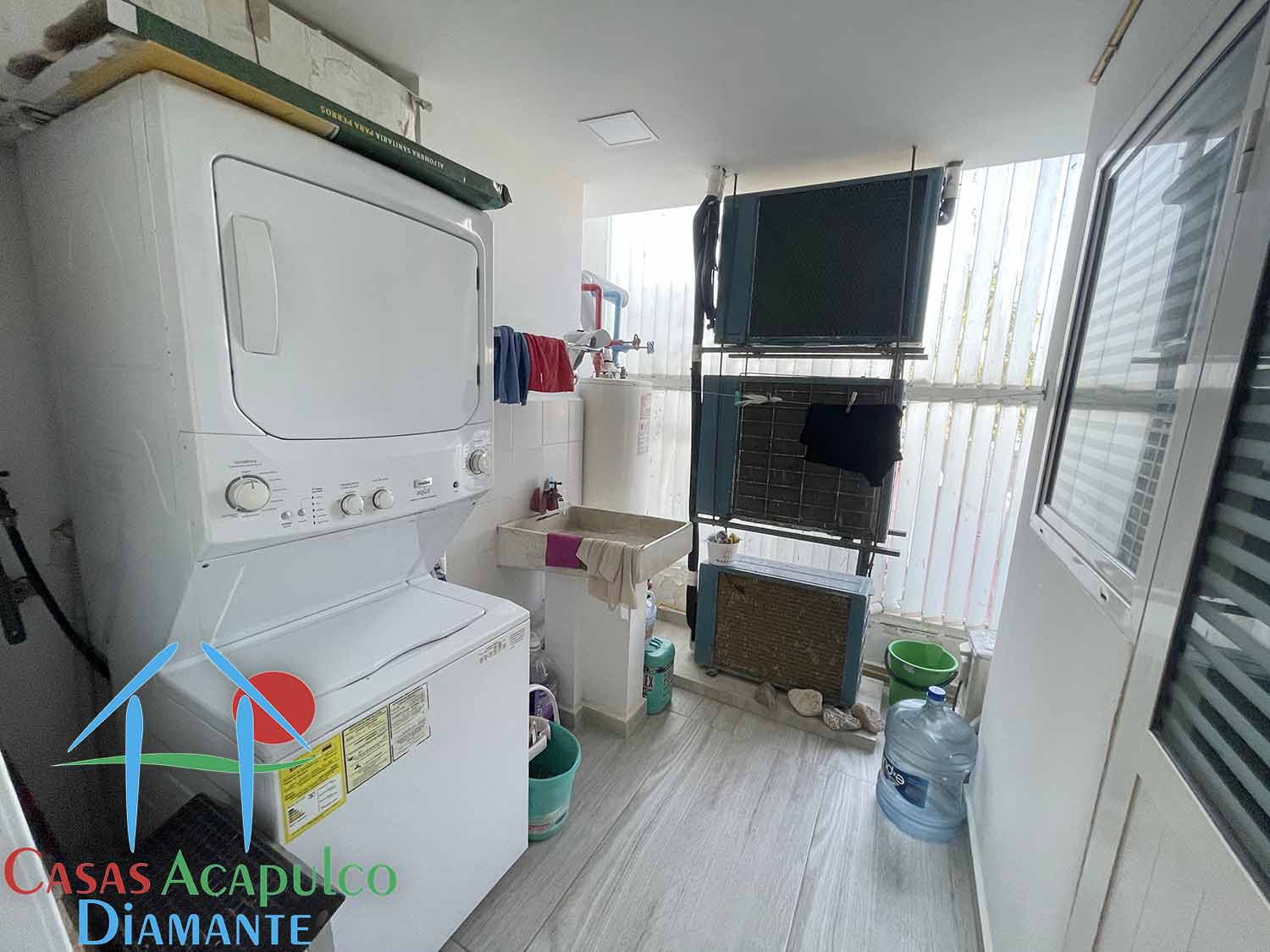 Maralago C 202 - Lavandería y cuarto de servicio antes de Otis 1